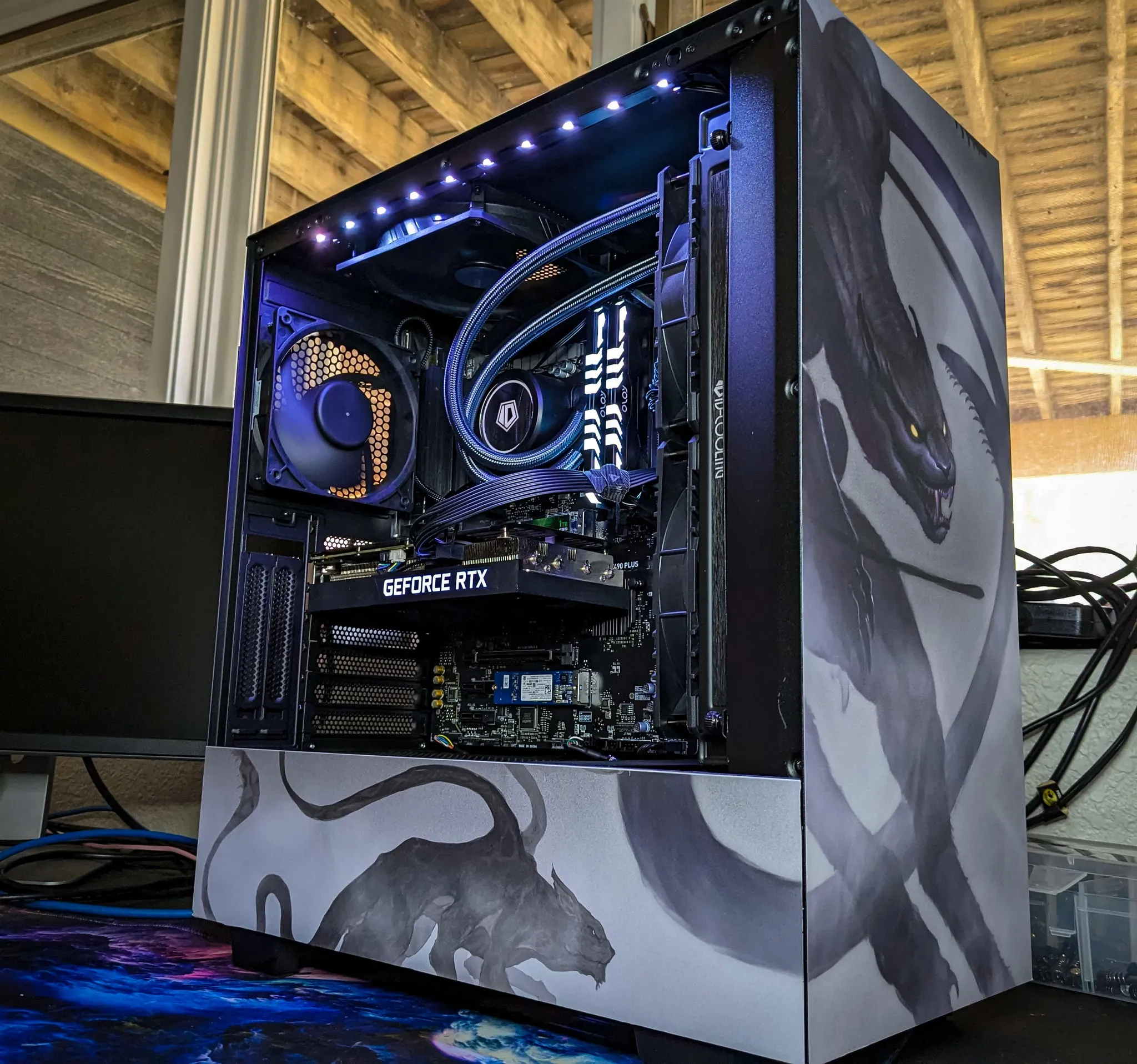 Front view of Displacer Beast-themed wrap on NZXT H510i case